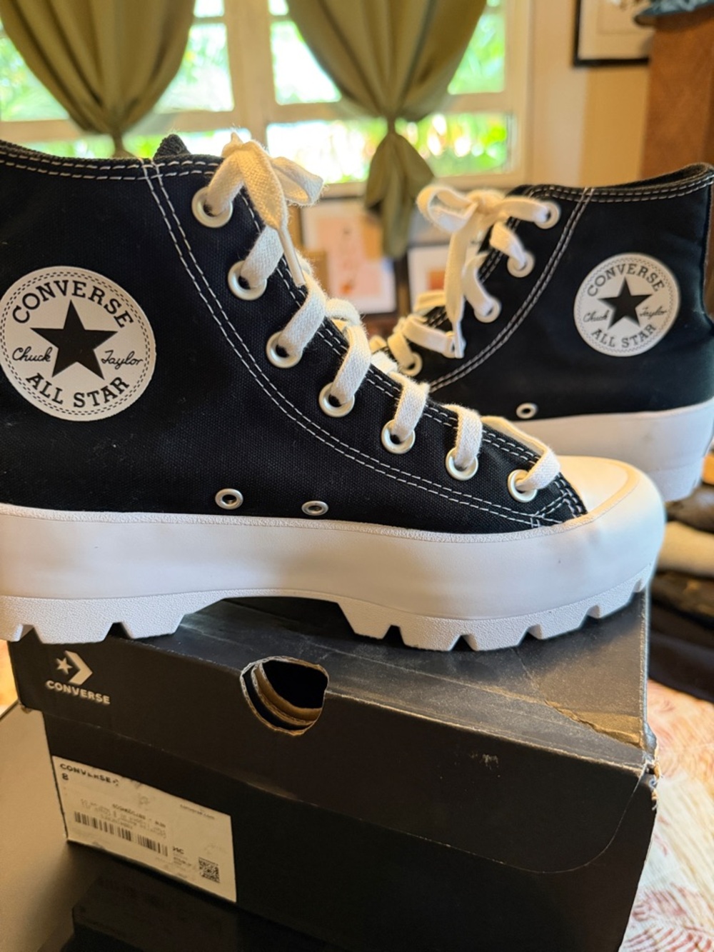 Converse Chuck All Star Lugged High Top Platform Sneakers in Black and White.
